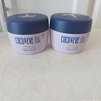 Front view of both sealed jars showing brand, product name and size