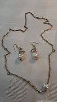 Necklace and both earrings overview