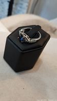 Ring on display stand showing overall design