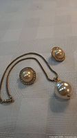 Necklace and earrings overall view