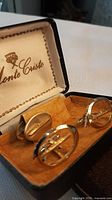 Cufflinks and tie clip inside Monte Cristo box