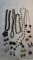 Entire lot showing necklaces, earrings and brooch