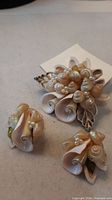 Brooch and both earrings front view