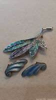 Brooch and earrings front view