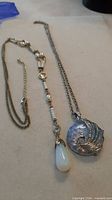 Both necklaces side by side showing full length and pendants