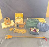 Group overview of all vintage vanity, purses, binoculars, knocker, back scratcher and boxes