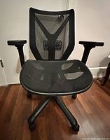 Front view of Y-frame mesh office chair showing seat, backrest and armrests