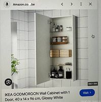 Screenshot of cabinet interior view and tiled bathroom setting