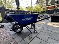 Left side profile showing logo, frame, tire, handles