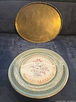 Brass tray and porcelain plate together