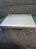 Front and top view of Sony DVD VCR combo showing overall condition and attached power cord