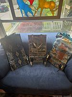 All three tapestry rolling shopping bags displayed on sofa