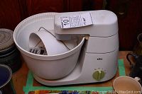 Front view of Braun food mixer with mixing bowl inside, showing overall condition and bowl size.