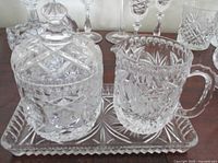 Creamer, covered sugar bowl on rectangular tray