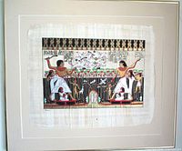 Front view of framed papyrus artwork showing full design and mat
