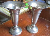 Pair of silver-plated trumpet bud vases front view