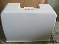 White Singer hard-shell cover front view