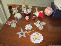 Group shot of all fifteen ornaments on tabletop