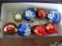 Box showing all eight glass ornaments