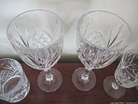 Top view of two etched goblets showing cut pattern inside bowls