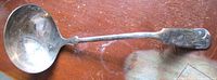 Full view of silverplate ladle front
