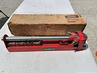 Full set showing ratchet handle, dies in holder and original box