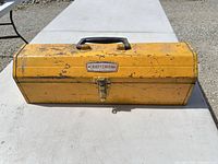 Closed yellow Craftsman toolbox exterior view