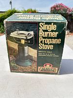 Front view of retail box for Greatland Outdoors single burner propane stove