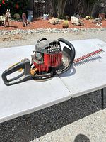 Full view of Homelite 26ht gas hedge trimmer right side
