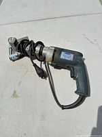 Full view of Kett KSV-432 panel saw with cord and blade