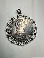 Obverse view of pendant showing Maria Theresa bust and bezel detail
