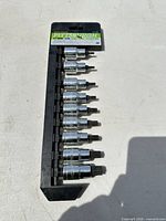 Full view of nine sockets on rail