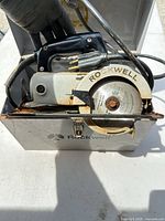 Circular saw inside metal Rockwell case