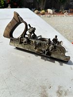 Left side profile of Stanley No. 45 plane showing handle, body and marking