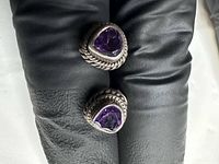 Front view of both sterling silver amethyst stud earrings