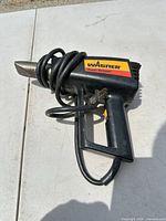 Left side view showing Wagner branding and overall tool
