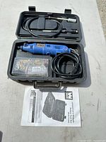 Complete rotary tool set open in case showing tool, flex shaft, bits, cord