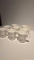All eight mugs group front view