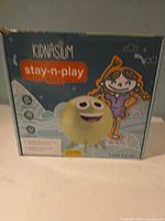 Front view of boxed Kidnasium Stay-n-Play hopper ball