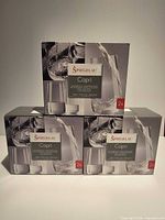 Front view of three sealed Spiegelau Capri two-packs