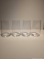 Front view of four clear Spiegelau tumblers