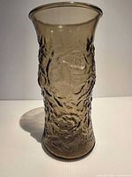 Full view of textured smoke glass vase