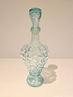Full view of aqua bubble glass decanter with stopper