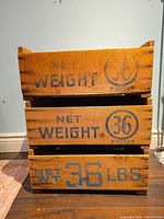 Front view showing two crates stacked, NET WEIGHT 36 POUNDS stencils