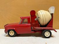 Left side view of red Tonka cement mixer truck