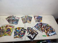 All 31 bagged comics laid out on two tables