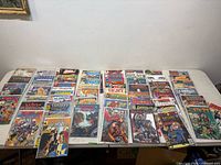 Tabletop view showing rows of the bagged and boarded comics