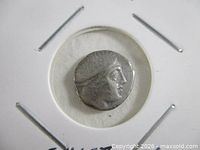 Obverse of silver drachm showing bust of Histiaia in coin flip