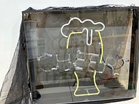 Front view showing full neon design and frame