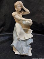 Front view of Royal Doulton Breezy Day figurine